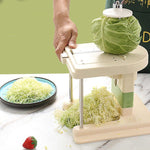 Beige multifunctional slicer chopper with stainless steel blades for shredding and grating vegetables in kitchen
