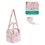 Double-layer insulated quilted pufferfish lunch bag with curved shoulder straps in pink, black, and off-white colors