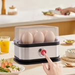 Compact black stainless steel egg boiler with portable design and 200W power rating