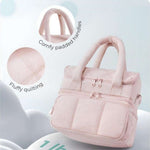 Double-layer insulated quilted pufferfish lunch bag with curved shoulder straps and heat retention features in pink color