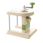 Beige multifunctional slicer chopper with stainless steel blades for shredding and grating vegetables in kitchen